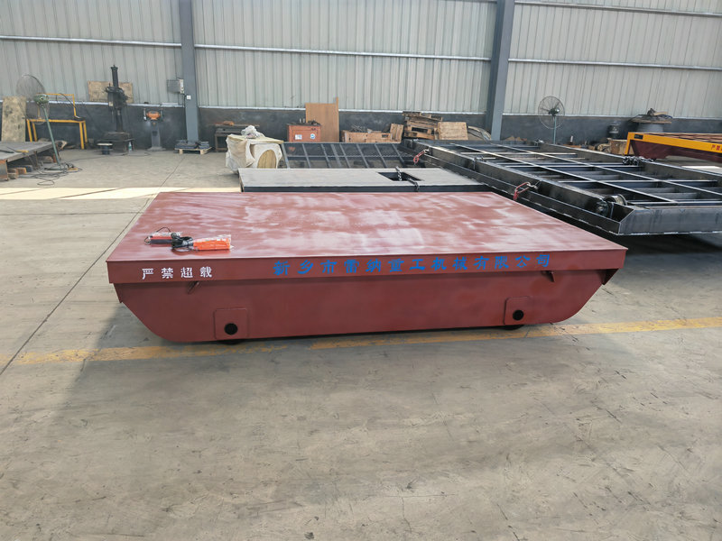 Raske materjali käitlemise seadmed Motoriseeritud raudtee ülekandekorv